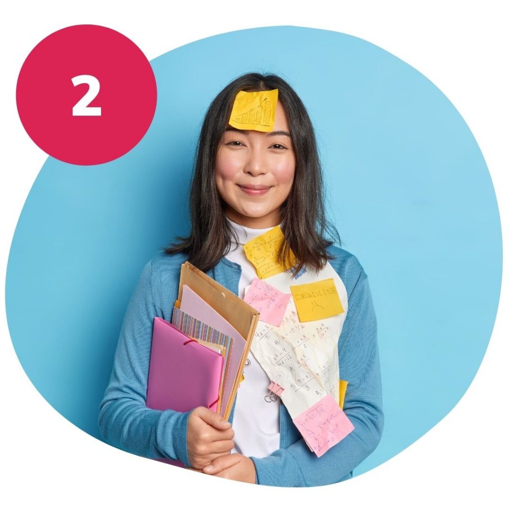 Woman with organiser and sticky notes