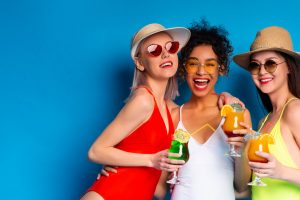 3 women in swimwear on a girls weekend away