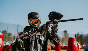 A Groopeze group playing paintball for work christmas party ideas