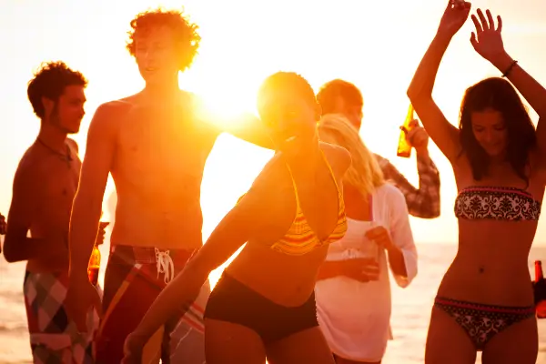 Leaving cert holiday goers on a beach for a beach party