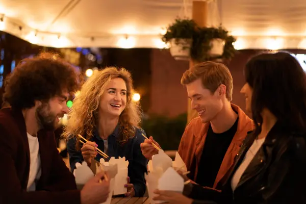 Colleagues team at an office or work christmas dinner night out